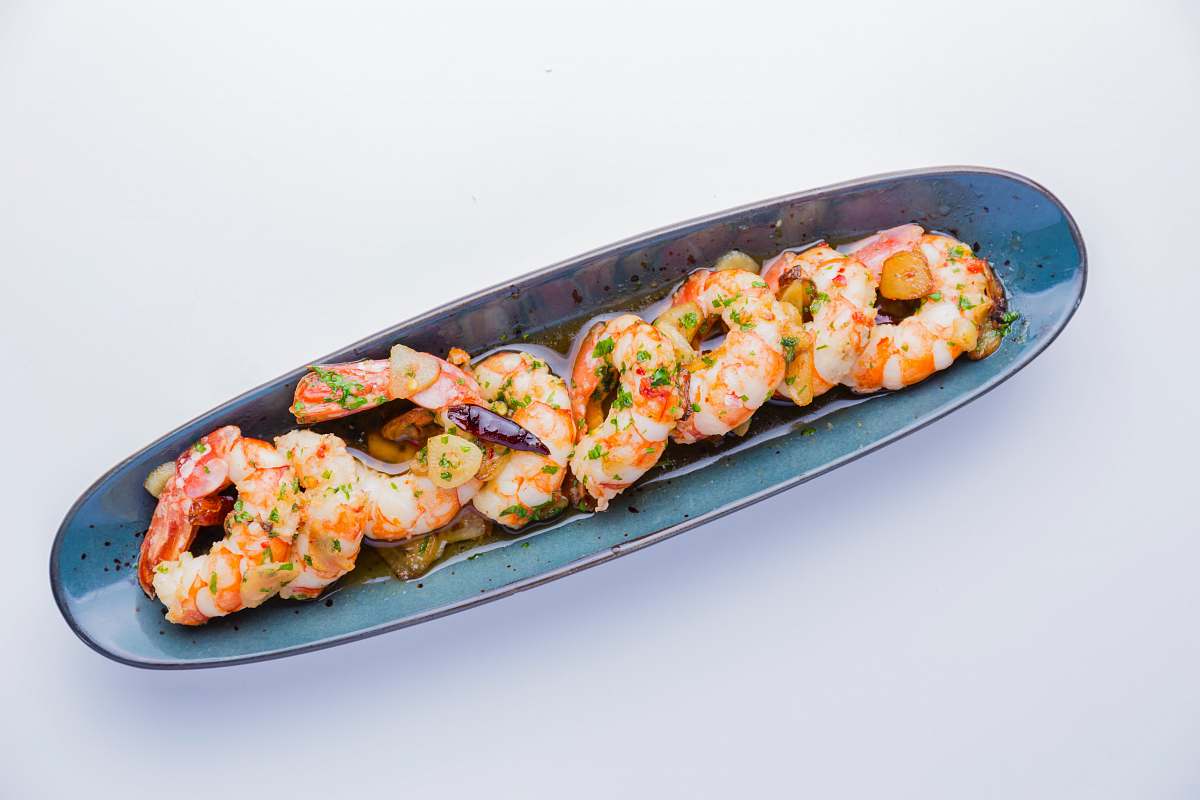 meal shrimp dish in gray oblong plate dish