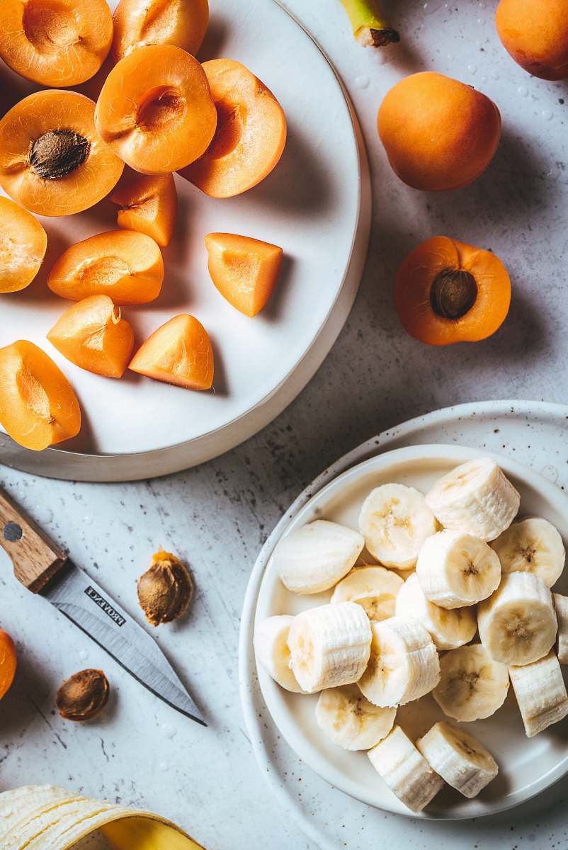plant sliced banana fruit and peach produce