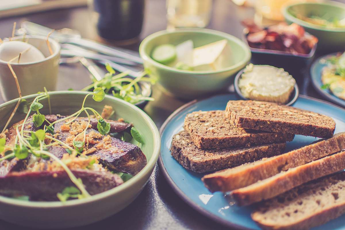 breakfast sliced breads on blue plate bowl