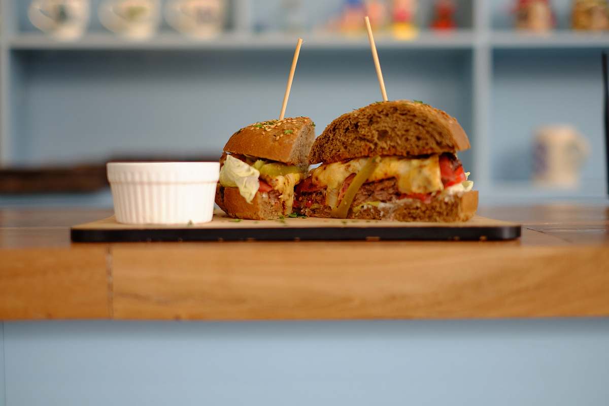 burger sliced burger on brown tray blue burger