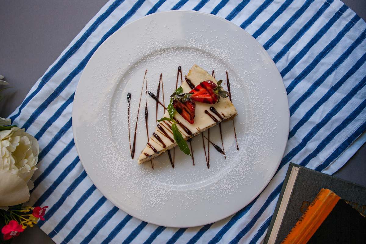 dish sliced cake in plate on table meal