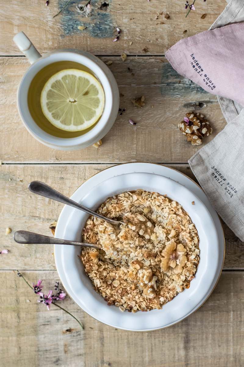 breakfast sliced lemon in white ceramic cup oatmeal
