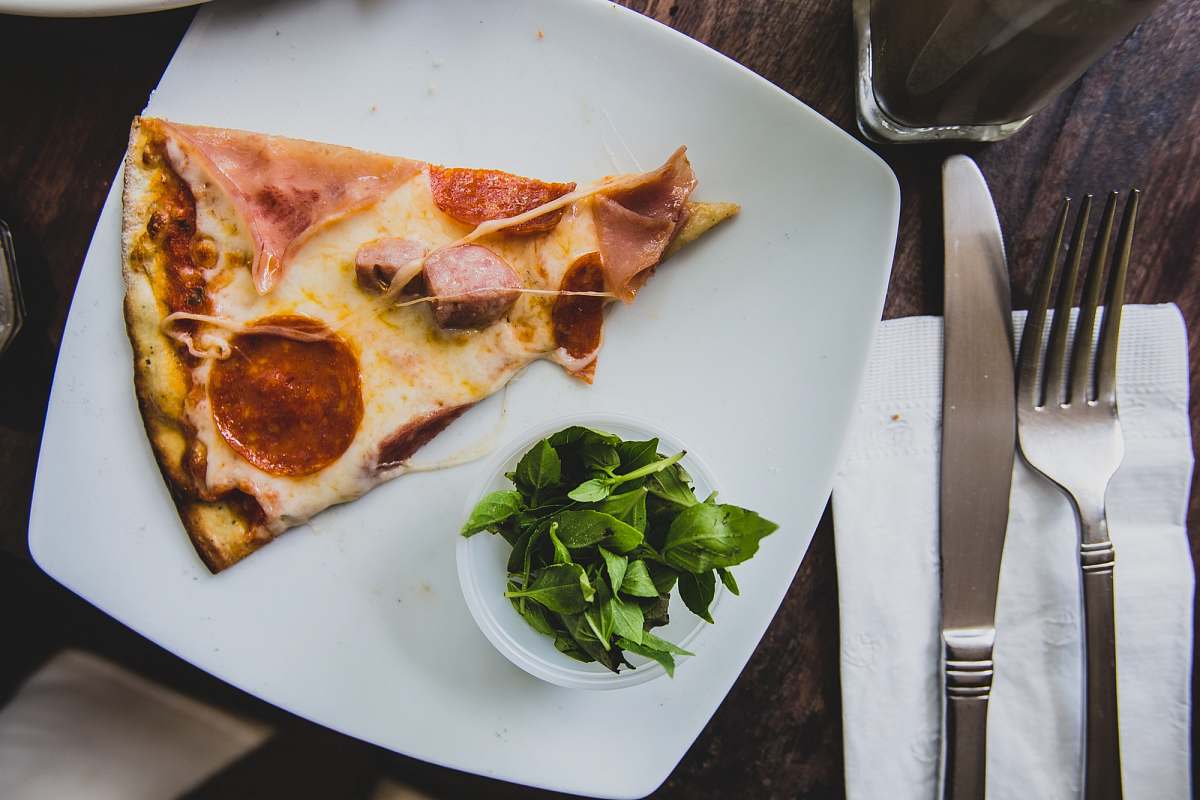 cutlery sliced pepperoni pizza on plate pizza
