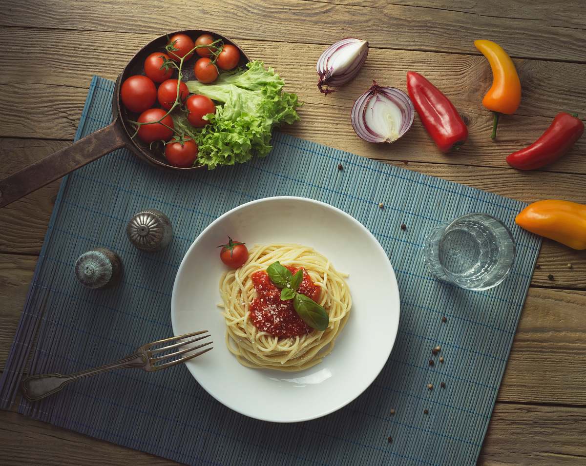 vegetable spaghetti on white ceramic plate produce
