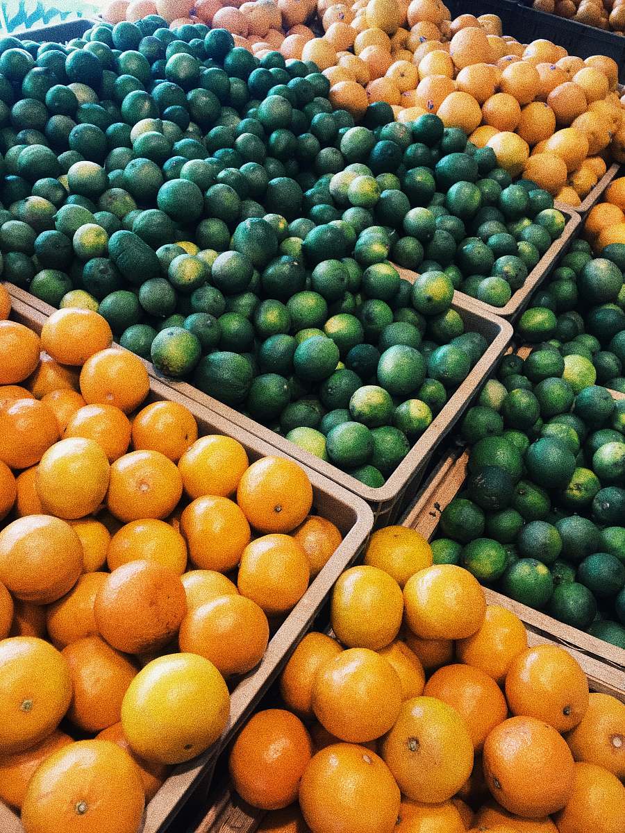 fruit tangerine and citrus fruits on display citrus fruit