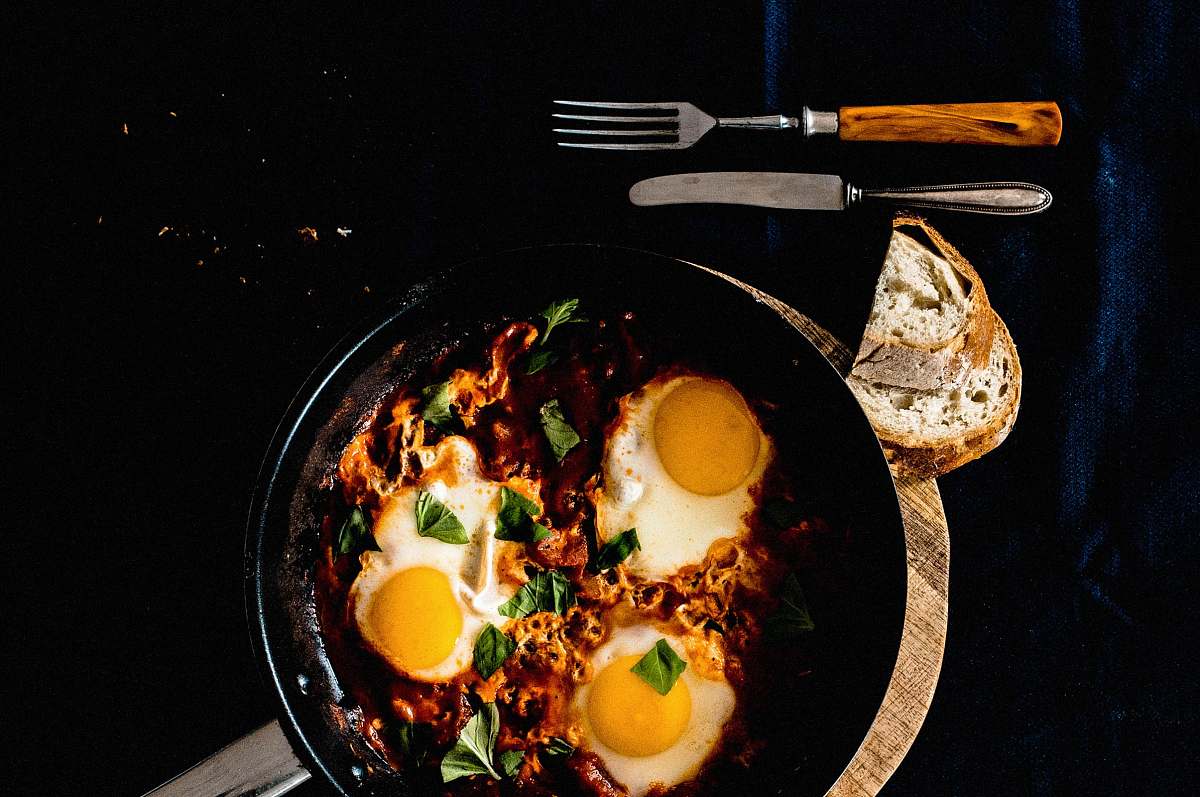 breakfast three fried eggs meal