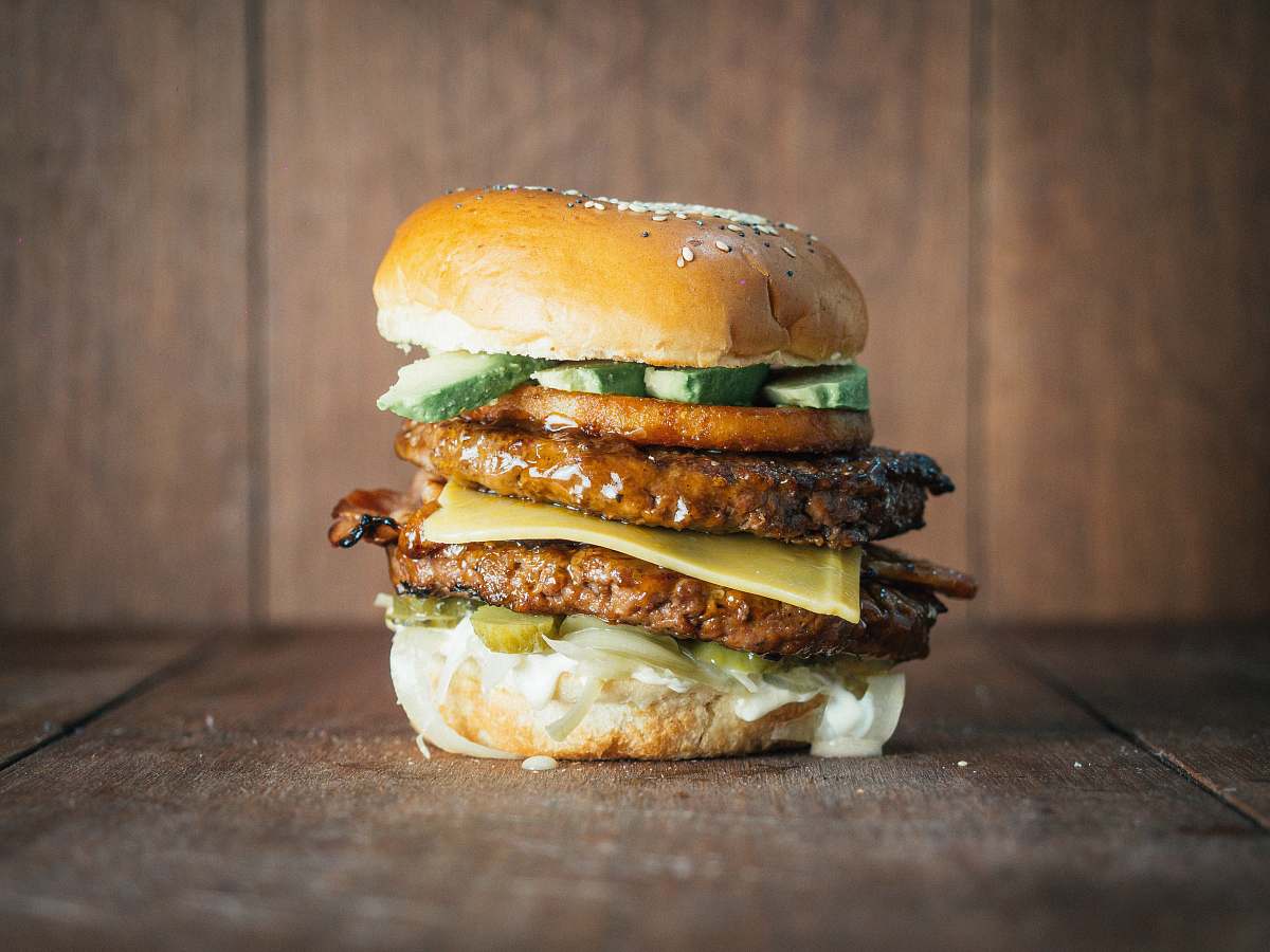 burger triple meat patty burger with cheese brown