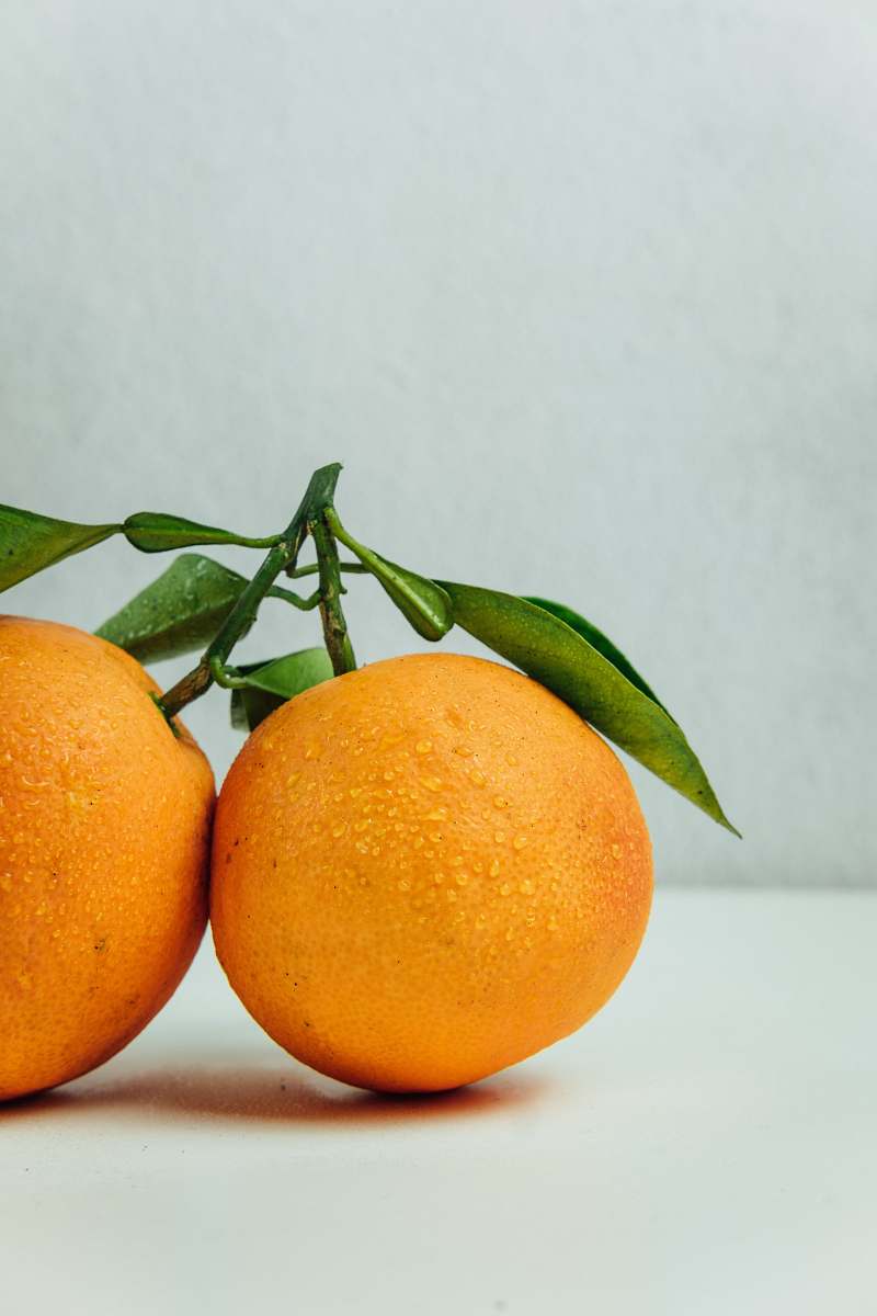 fruit two orange fruits on table orange
