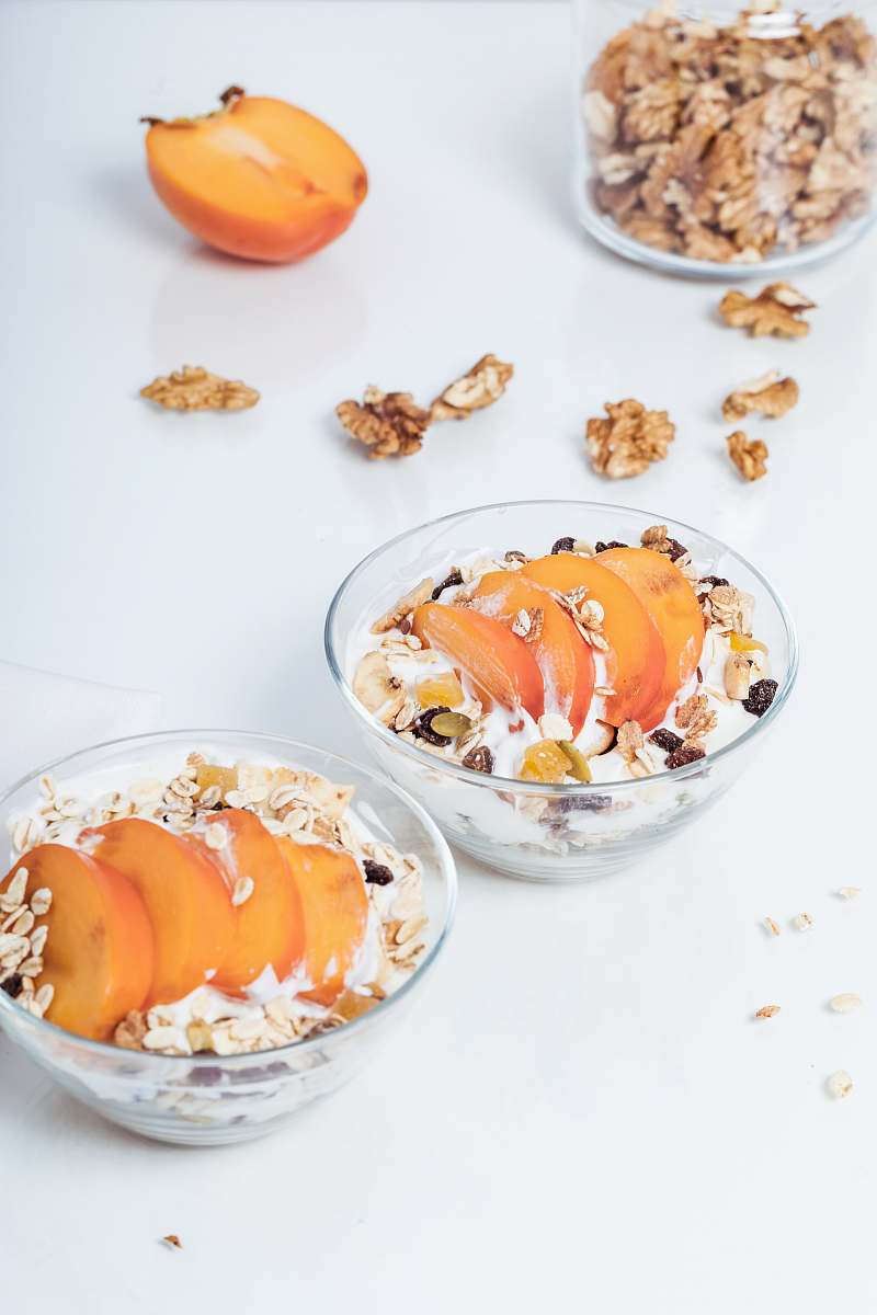 fruit two round glass bowls with food in its breakfast