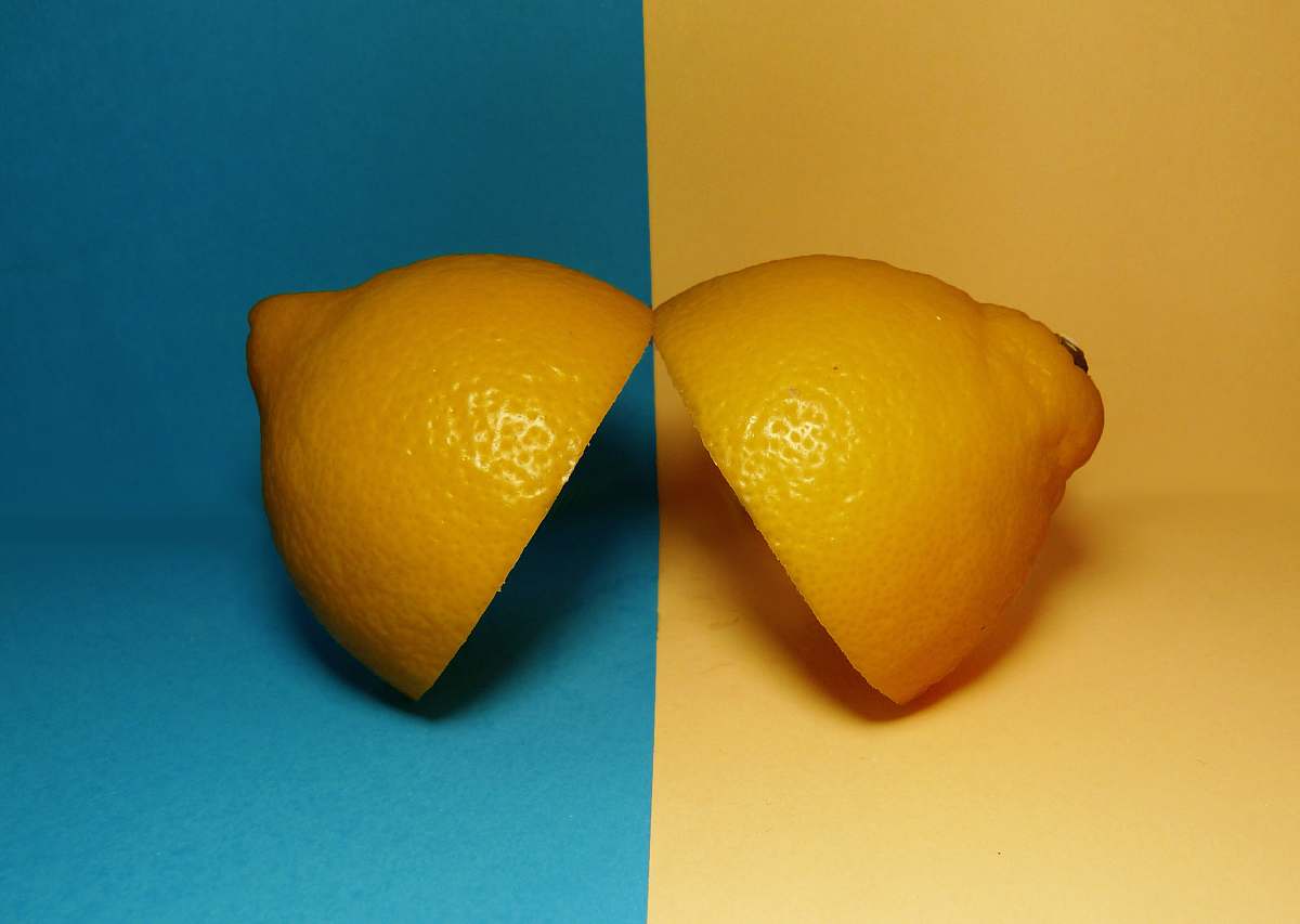 fruit two sliced lemons on surface citrus fruit