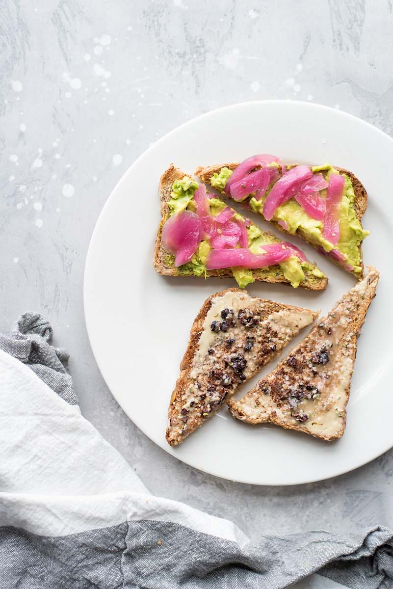bread two vegetable sandwiches on white plate toast
