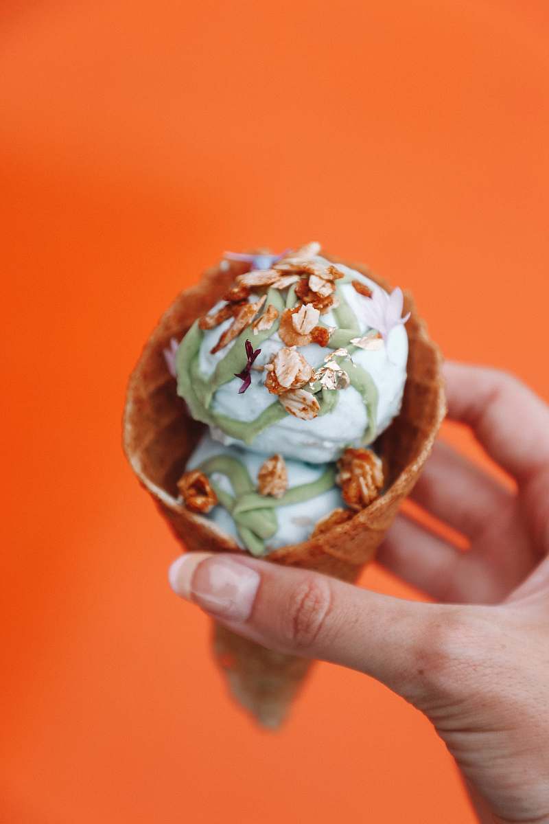 dessert vanilla ice cream with peanuts in ice cream cone cream