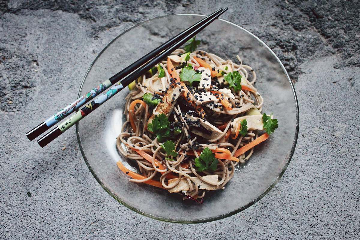 noodle vegetable noodle with chopstick on glass plate pasta