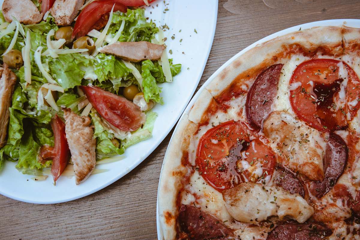 pizza vegetable salad in ceramic plate meal