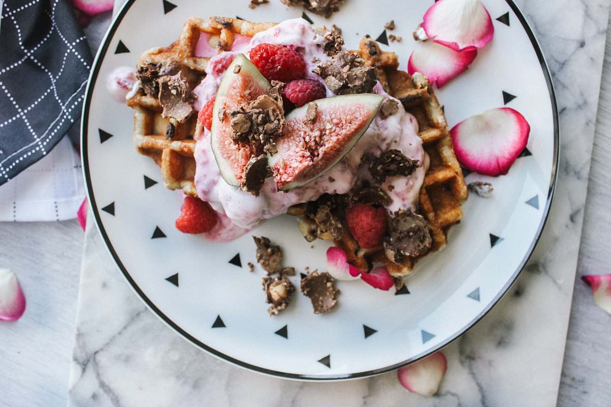 dessert waffle with strawberry and creme donut