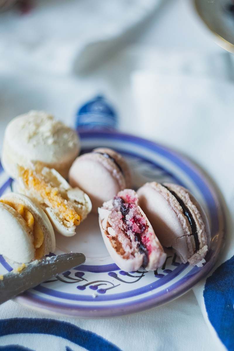 creme white cookies on white and blue ceramic saucer cream
