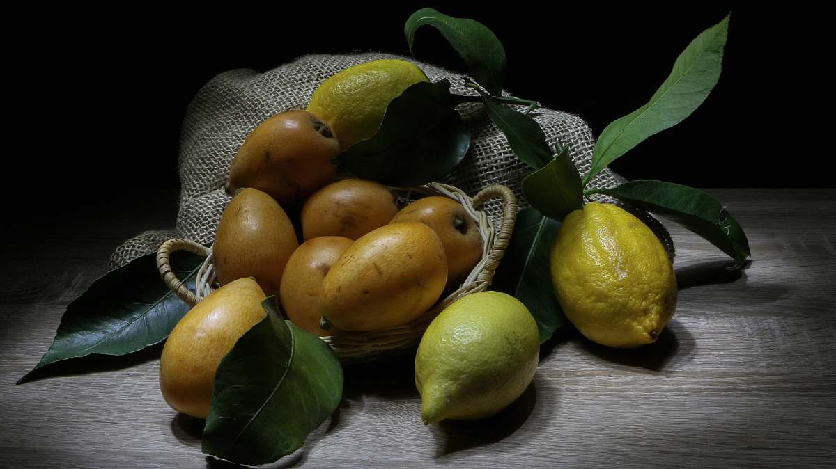 plant yellow fruits on brown surface fruit