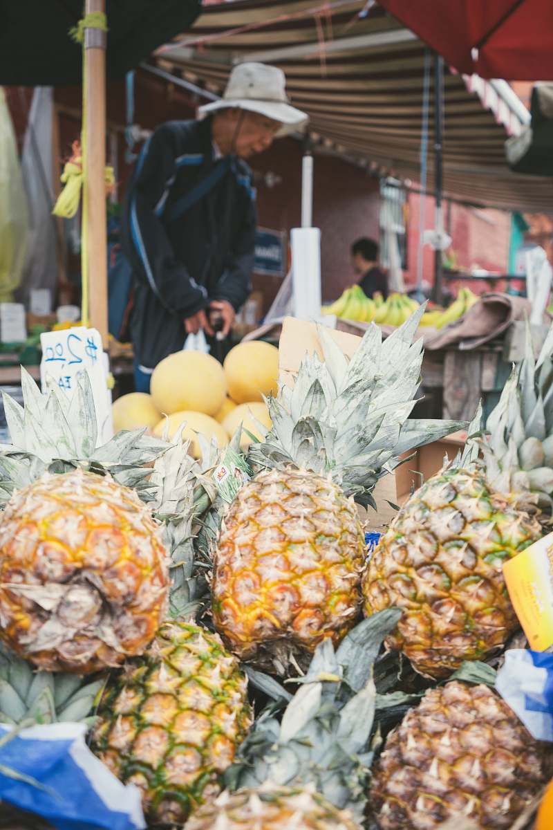 pineapple pile of displayed pineapple fruits food