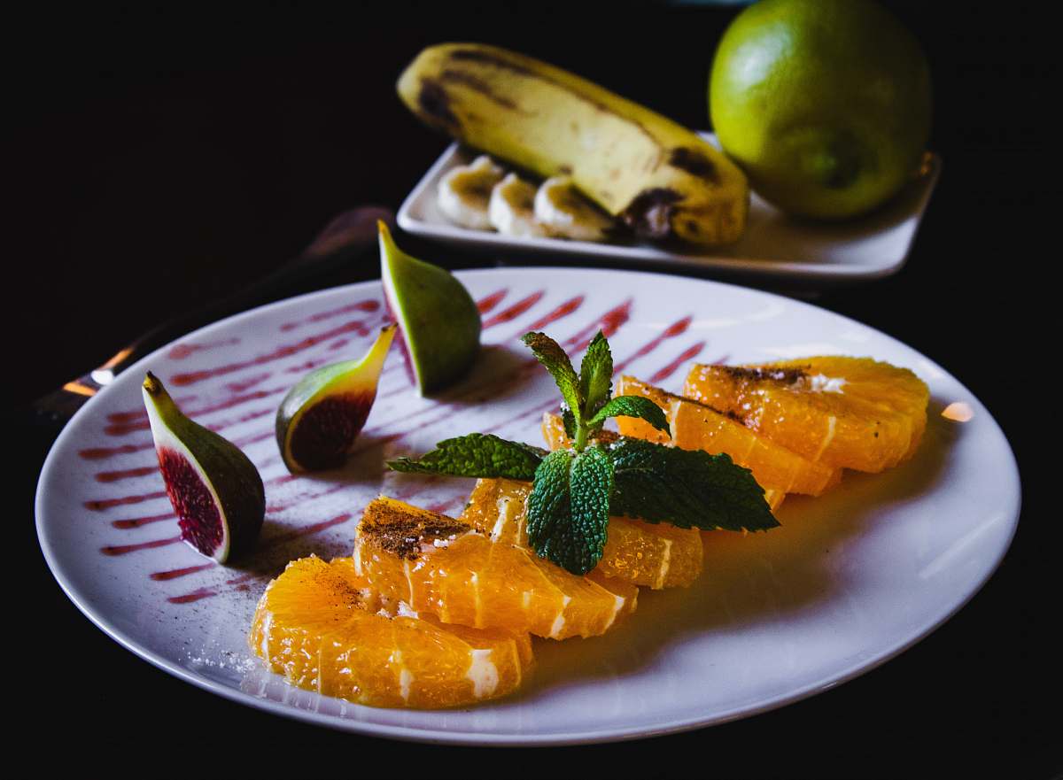 food sushi dish with mint citrus fruit