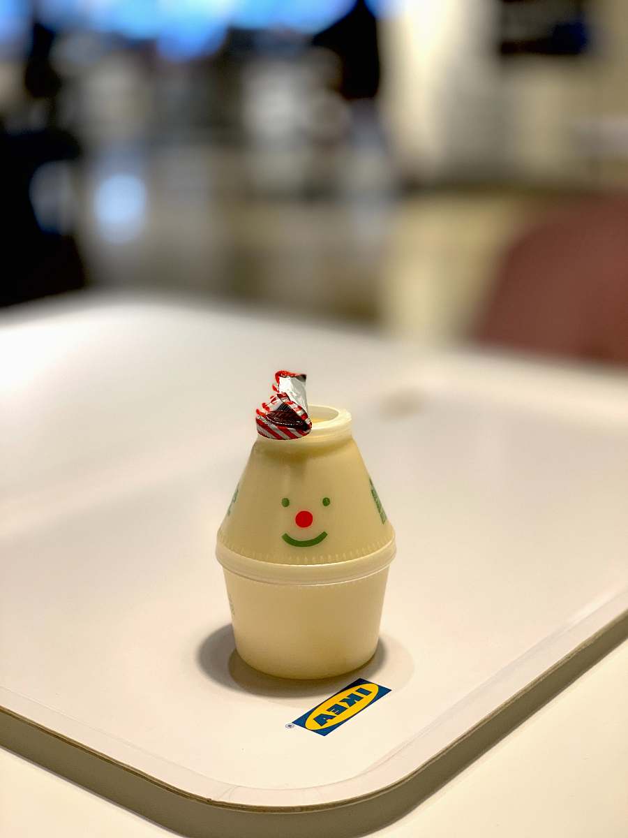 beverage white plastic cone toy on white IKEA tray drink