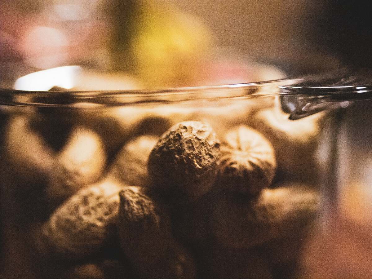 food photo of brown nuts on glass food container nut