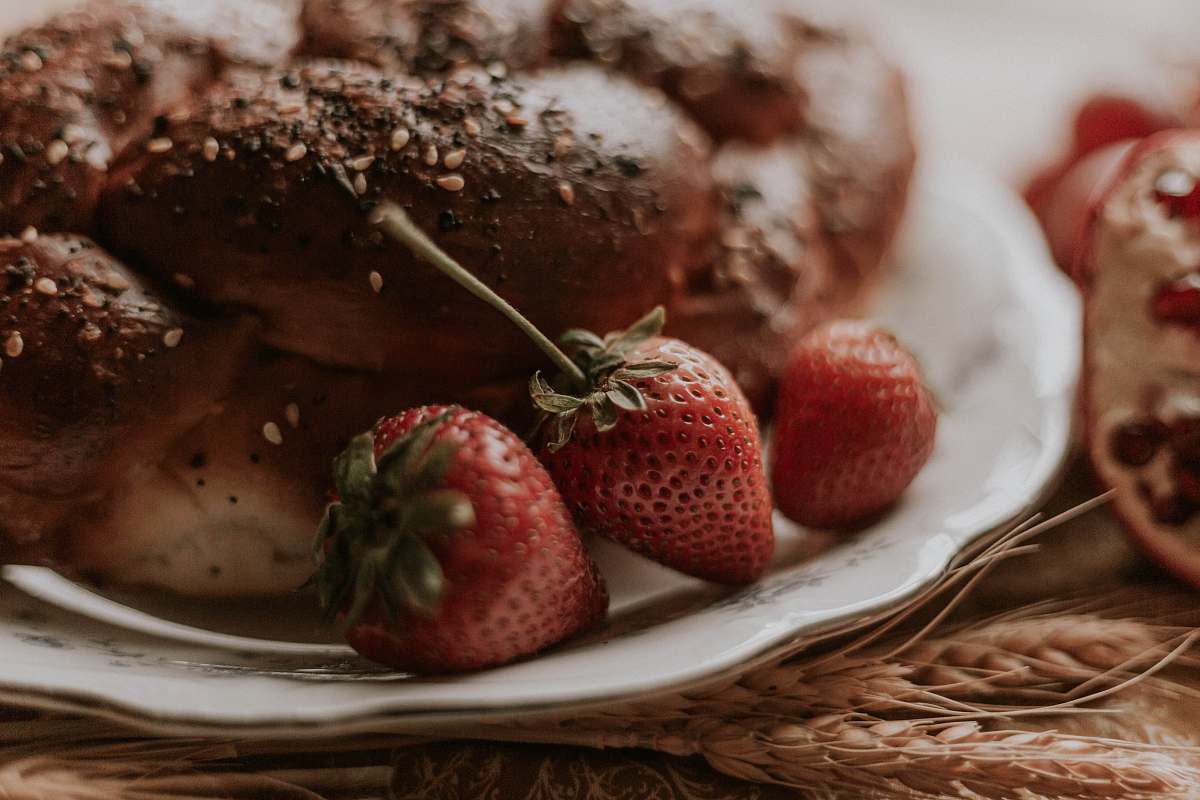 food plate of bread and strawberries fruit