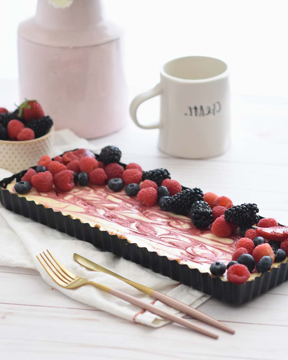 food raspberries and gold cutlery raspberry