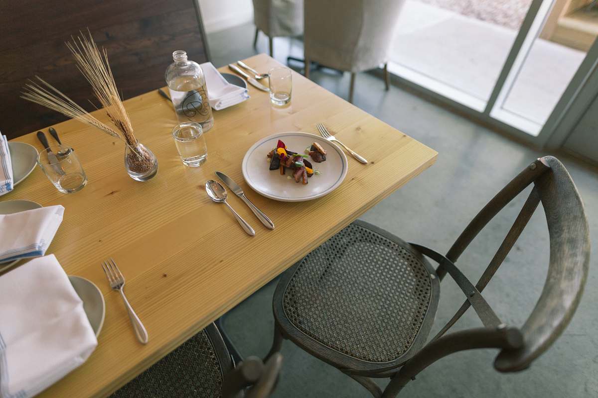 cutlery white ceramic plate and silver flatware on table furniture