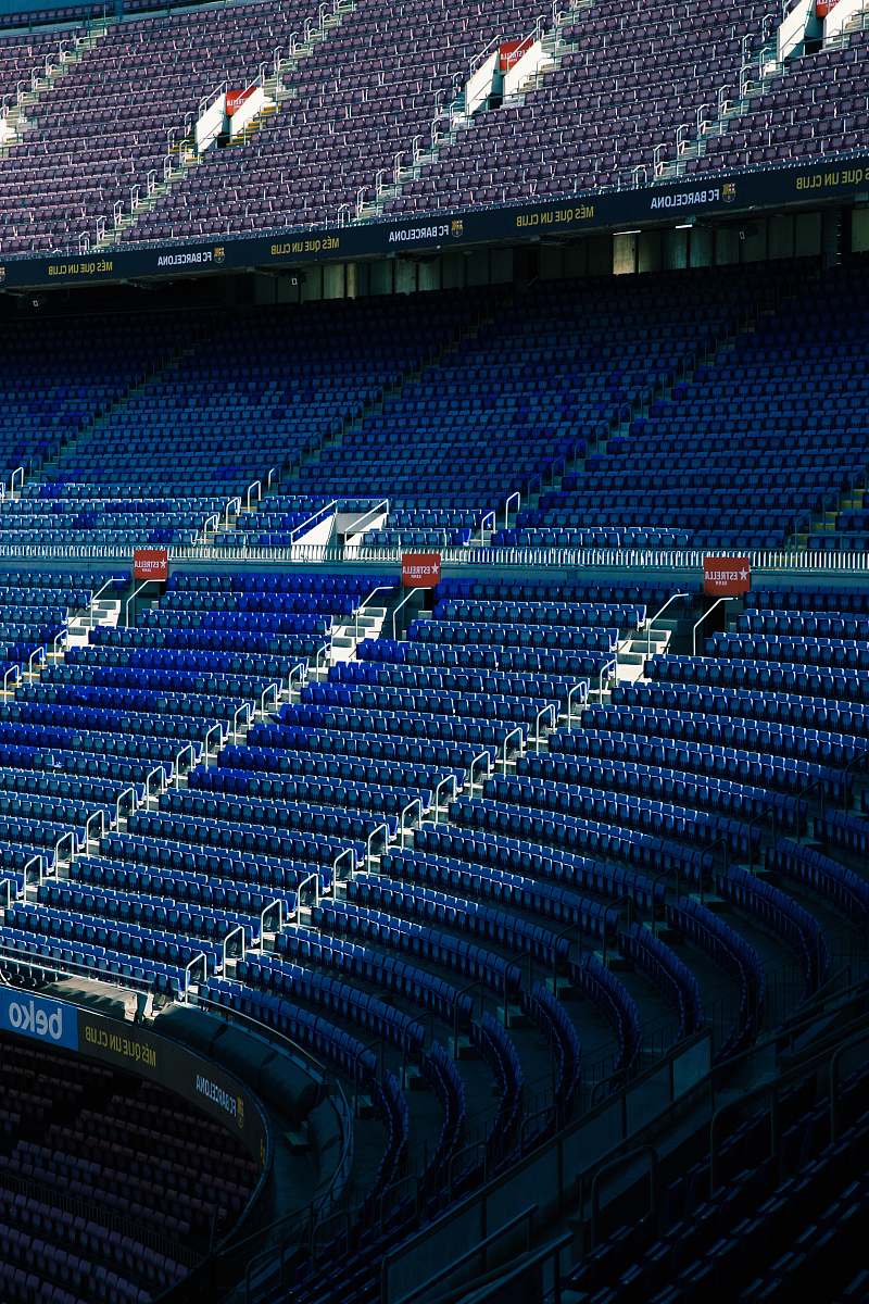  empty stadium bleachers during daytime 