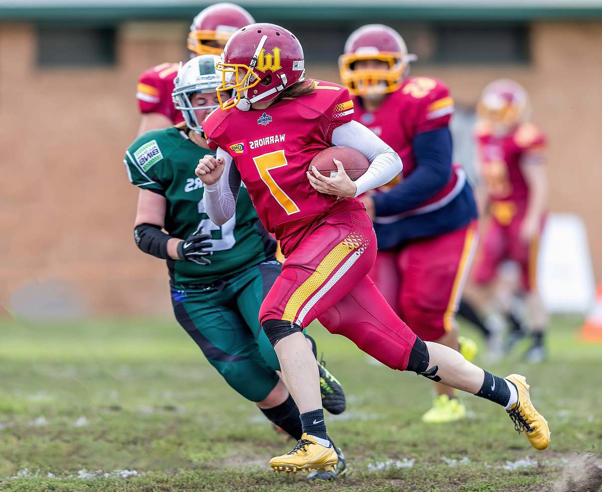 clothing football players running on field helmet