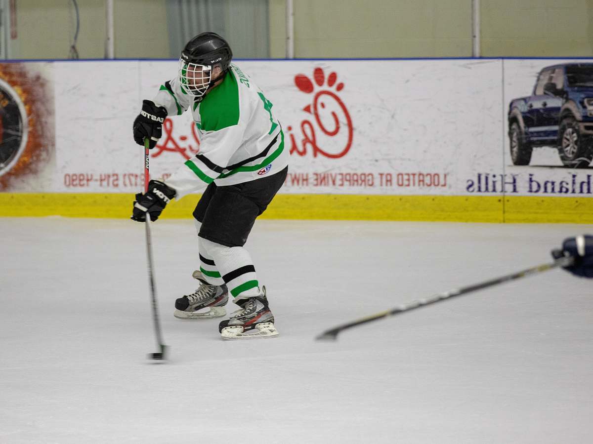 human hockey player on ice court person