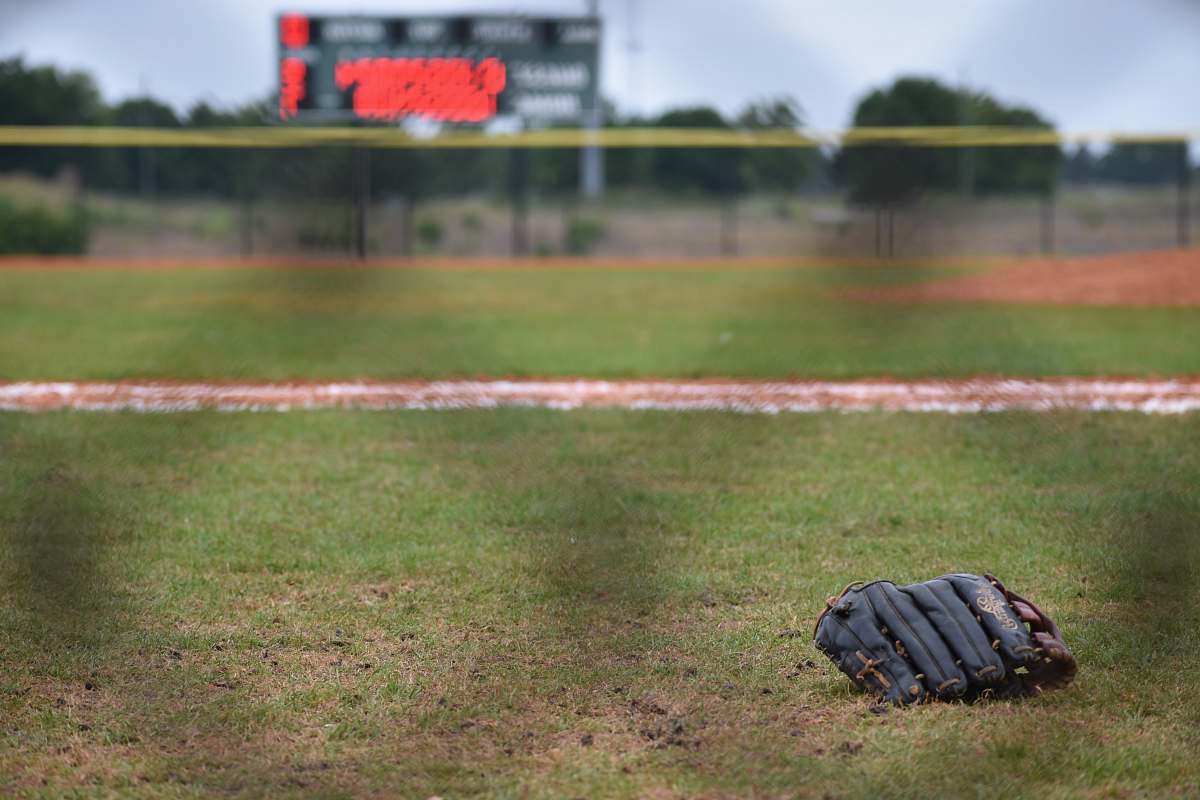 clothing leather baseball mitt on ground sport