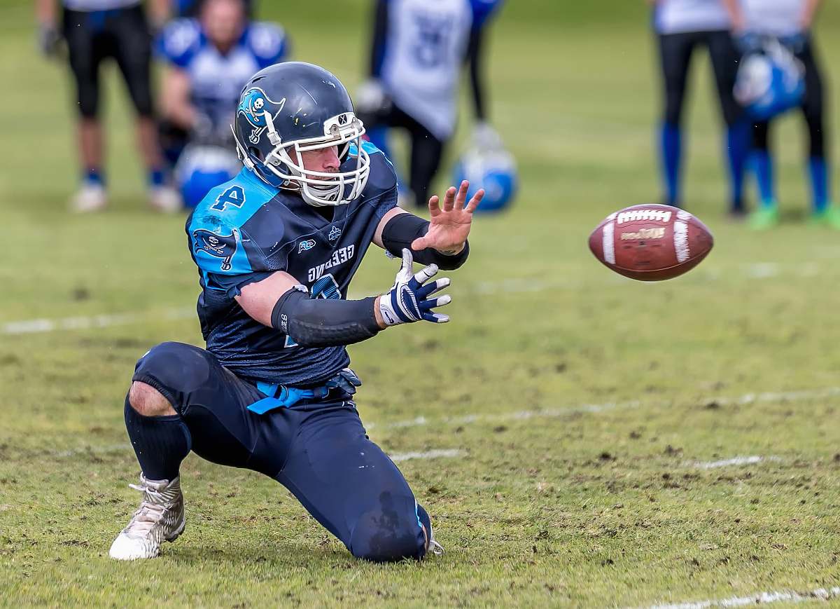 clothing man in blue jersey shirt helmet