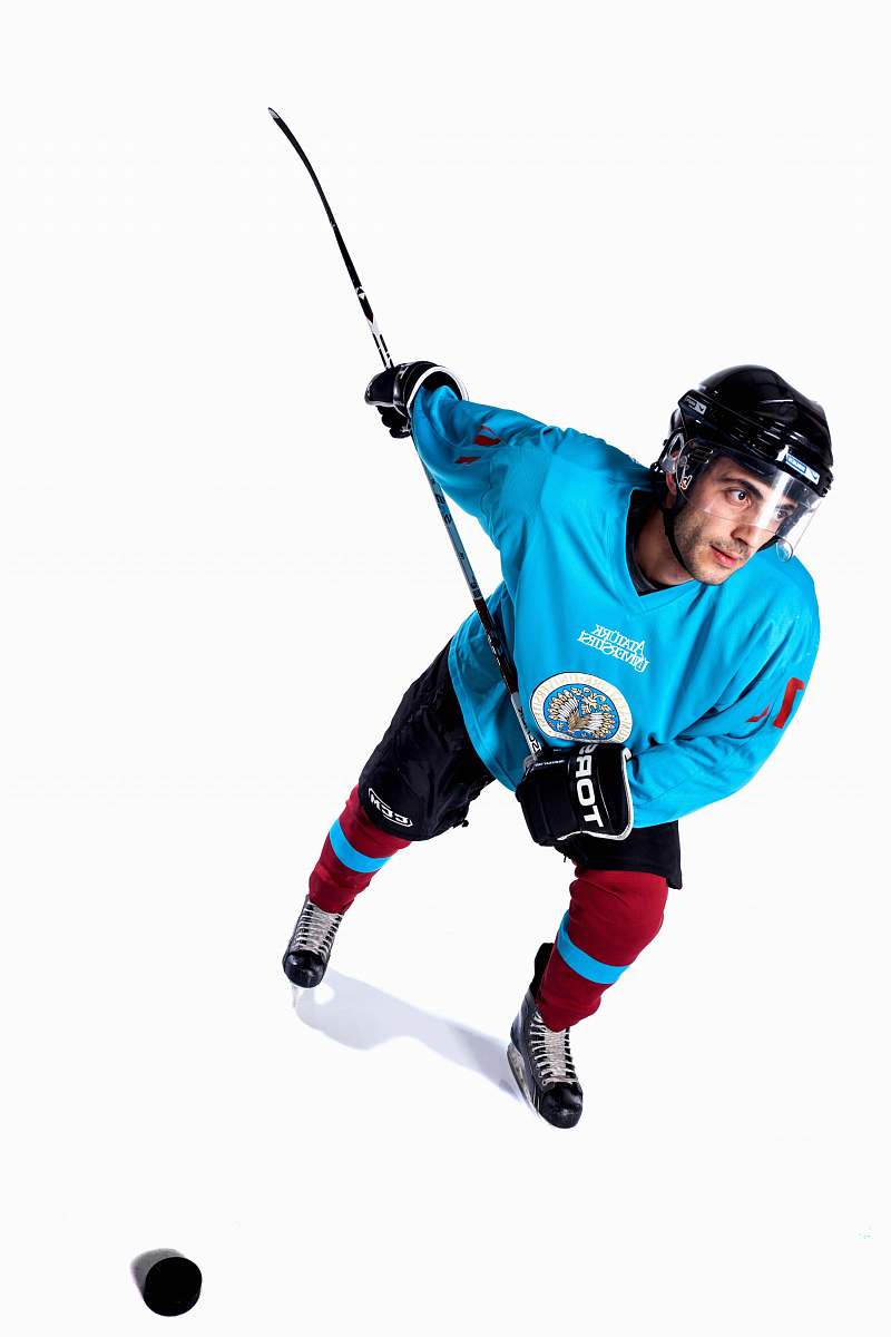 clothing man playing hockey helmet