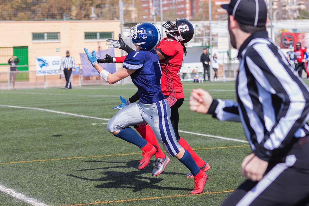 clothing men playing football at daytime helmet