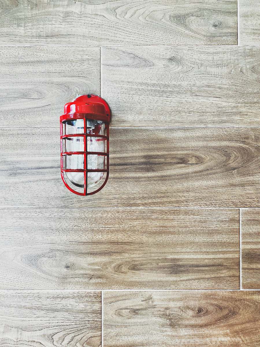 clothing shallow focus photo of red sconce helmet