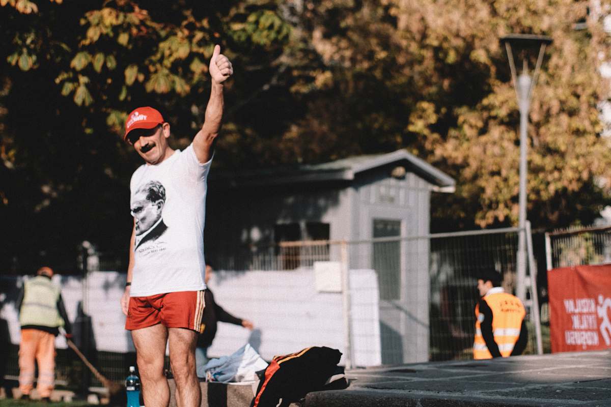 clothing standing man in white and black shirt shorts