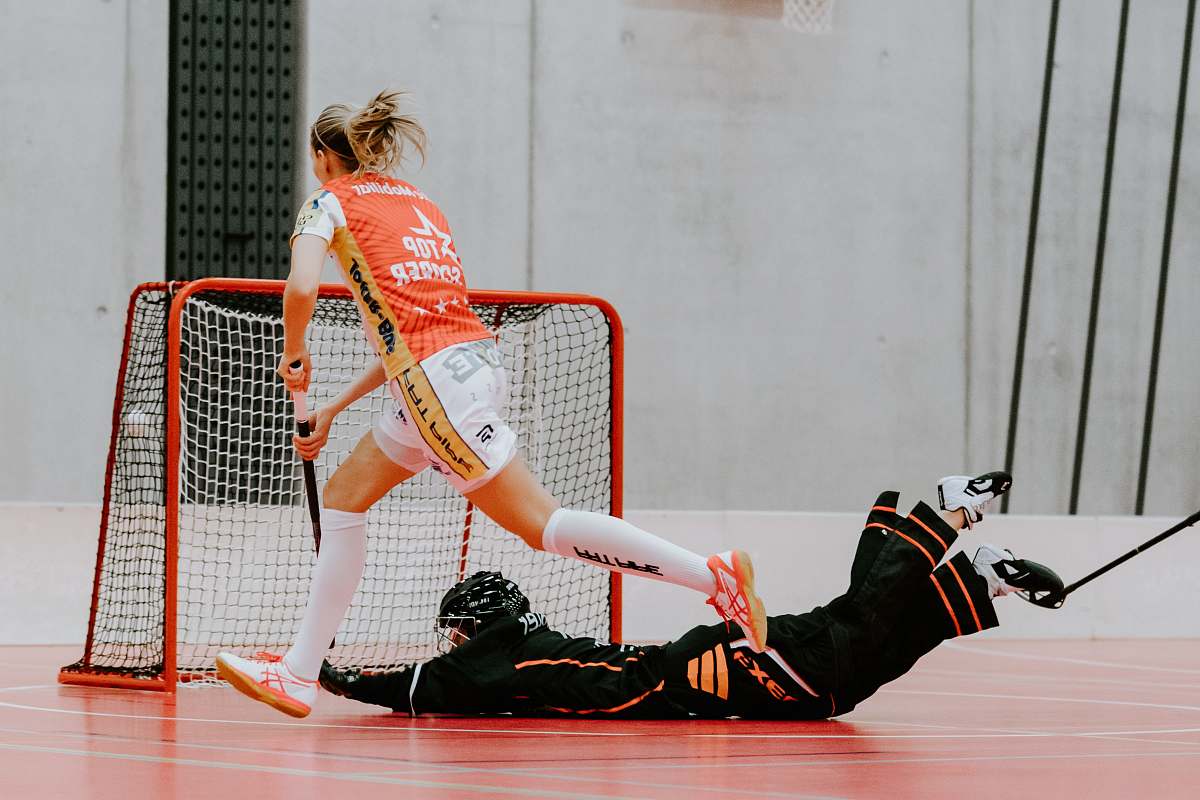 clothing unknown persons playing hockey sphere