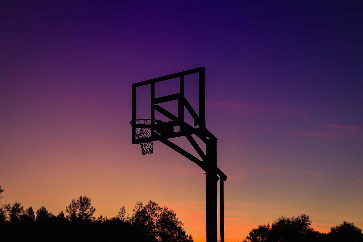 sky silhouette of basketball system sunset