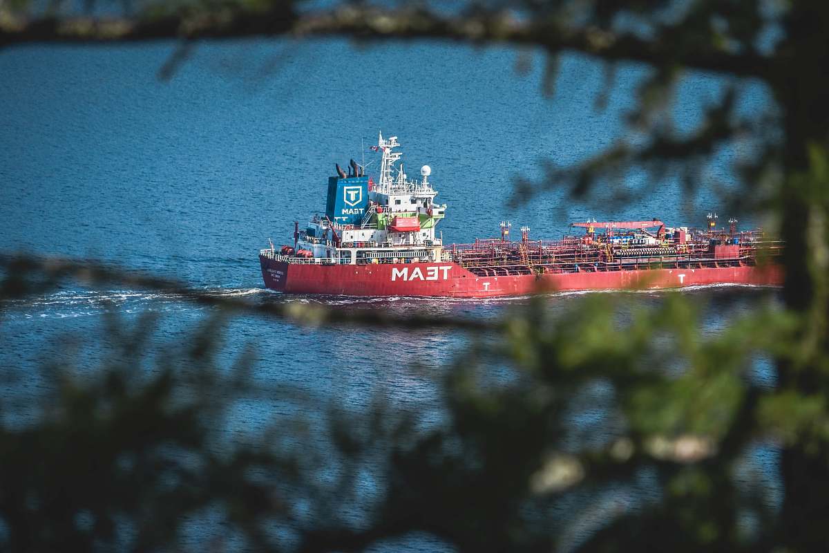 transportation red Team cargo chip in body of water vehicle