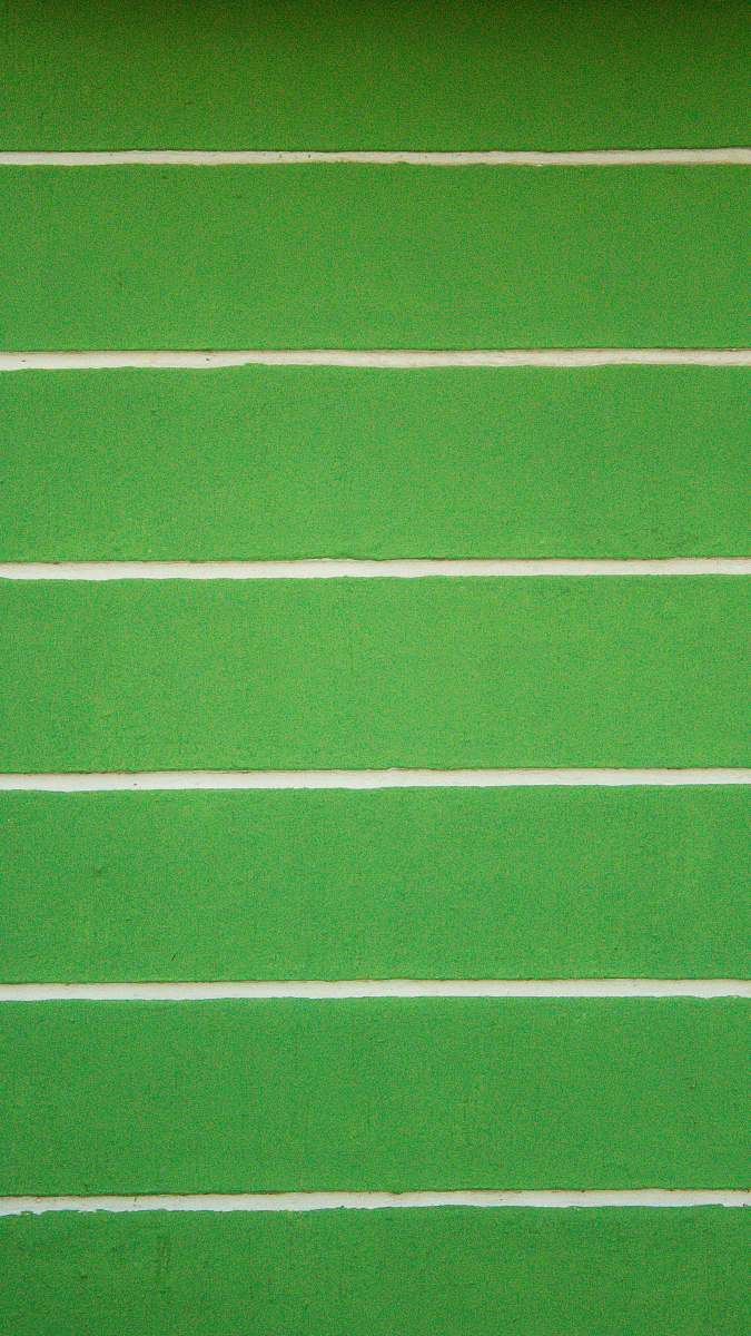 green green and white striped wall football