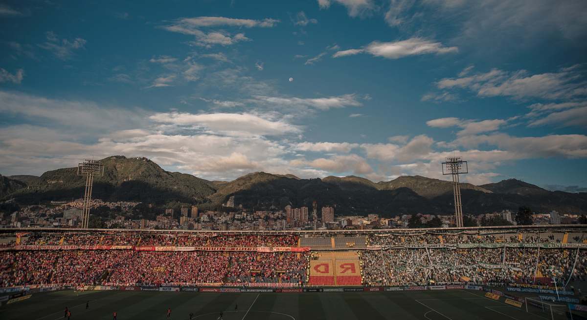 arena green mountains at daytime stadium