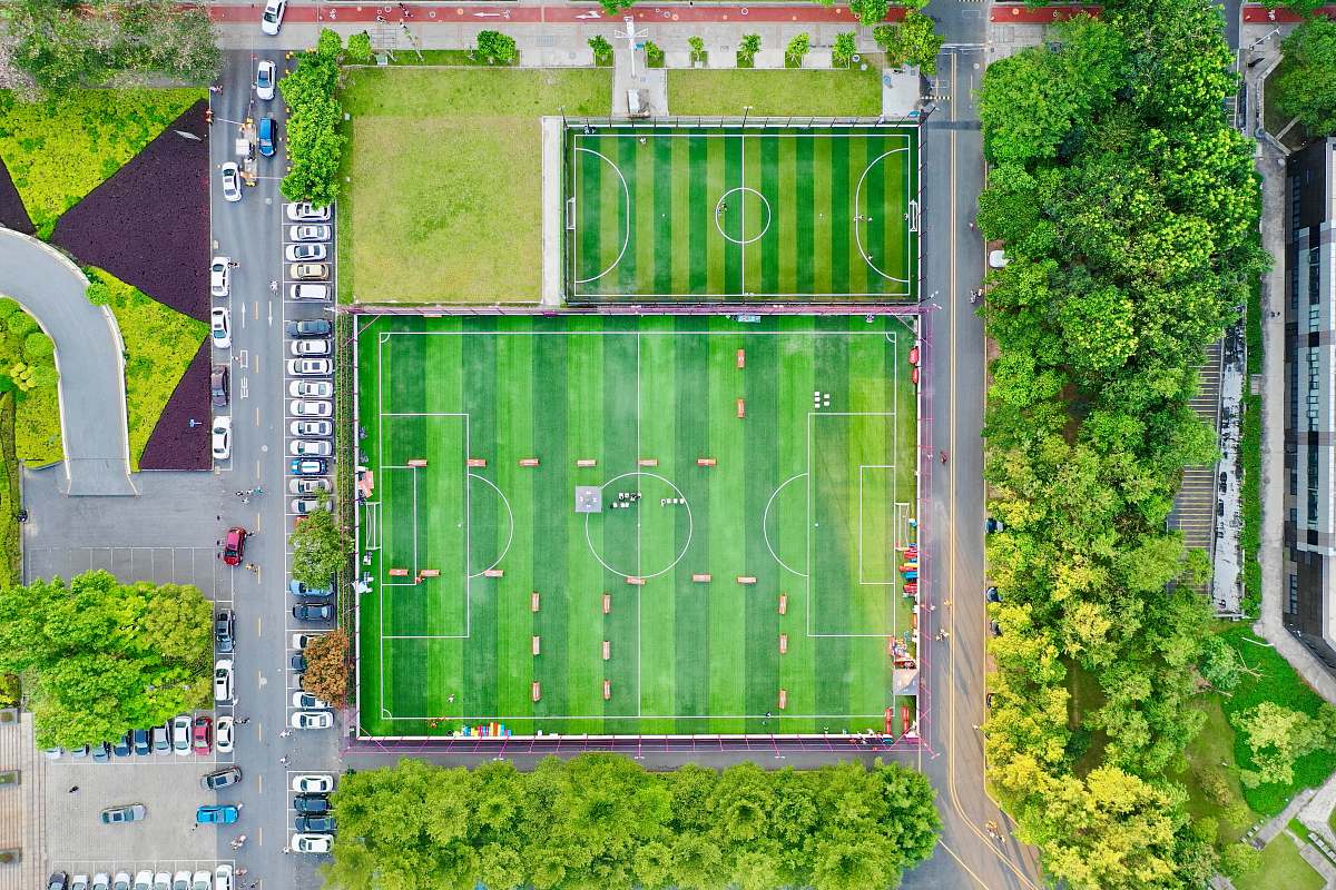 field top view photography green football field daji central street 2nd alley