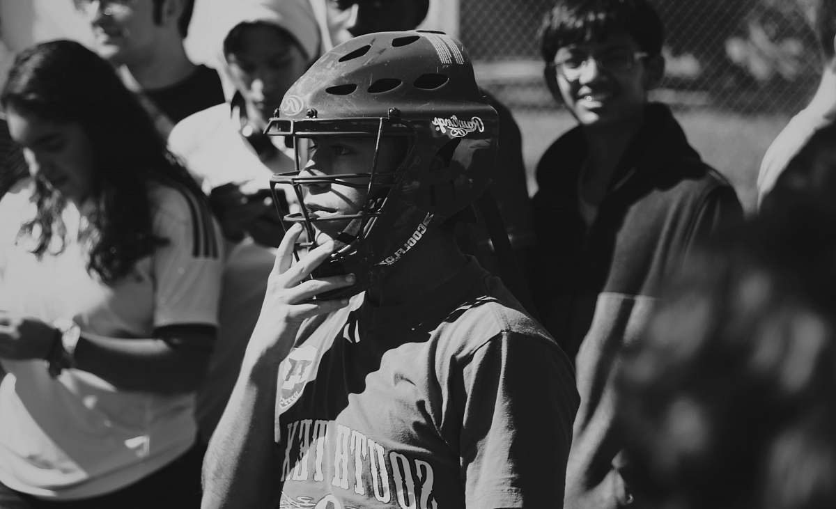 apparel grayscale photo of man wearing catchers helmet black-and-white