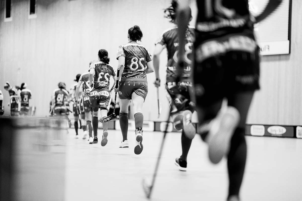 black-and-white group of field hockey player apparel