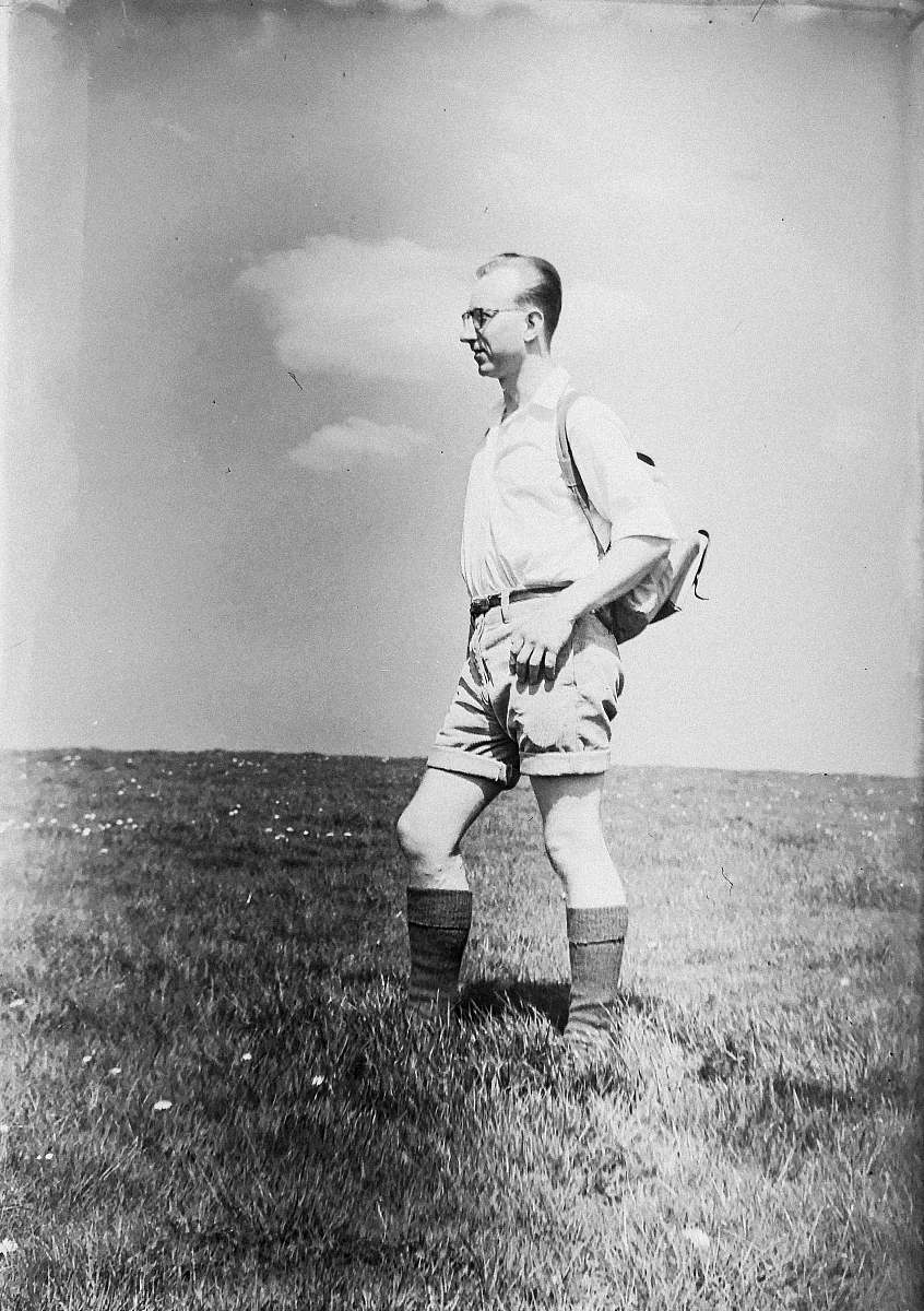 black-and-white man standing on field photo apparel