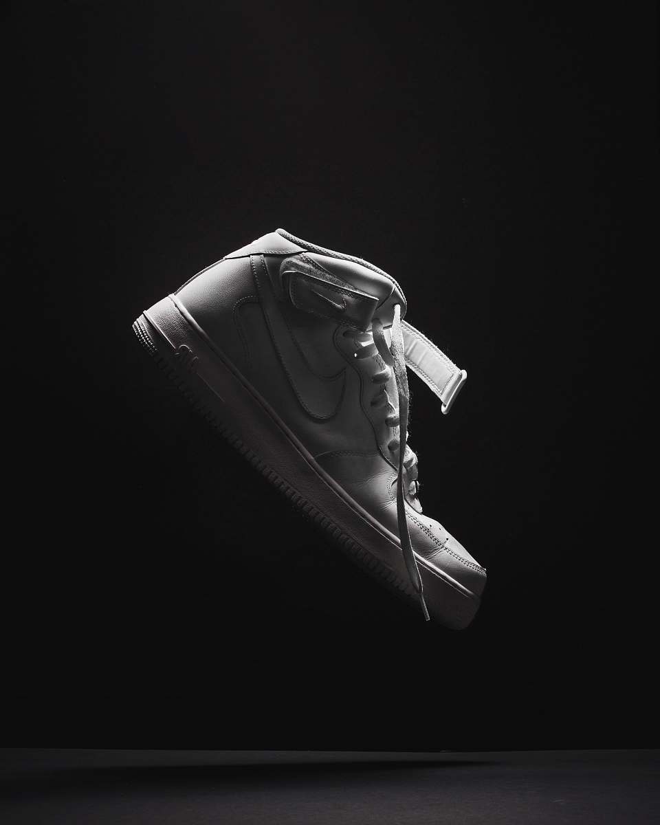 apparel unpaired white Nike Air Force 1 black-and-white
