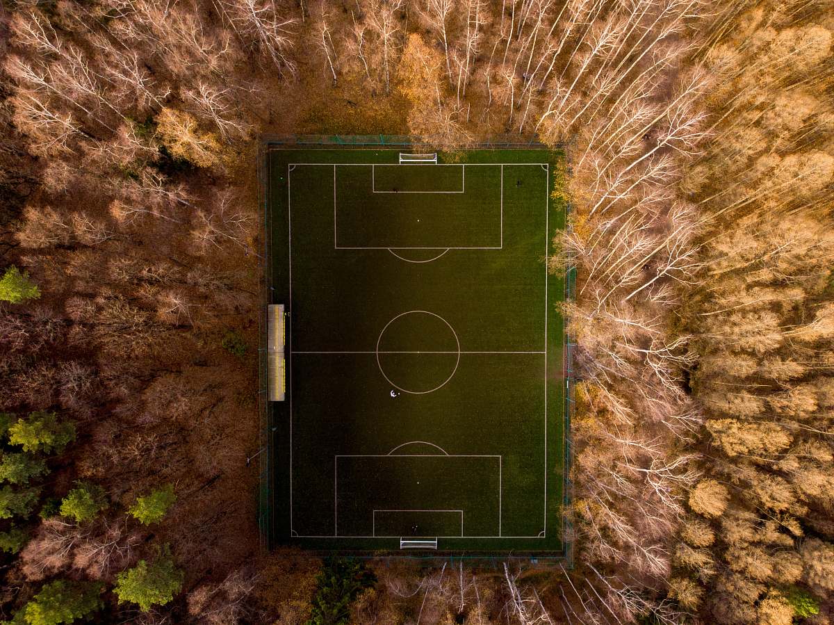 building aerial photo of soccer field arena