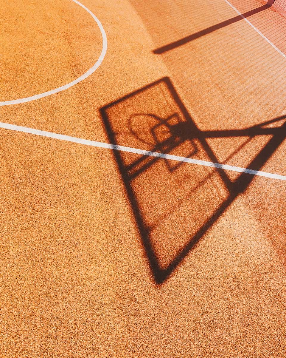 handrail shadow of basketball hoop banister