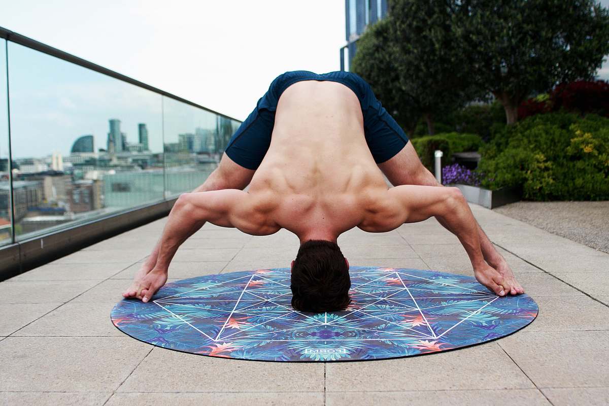 jar man doing acrobat stunt outdoor plant